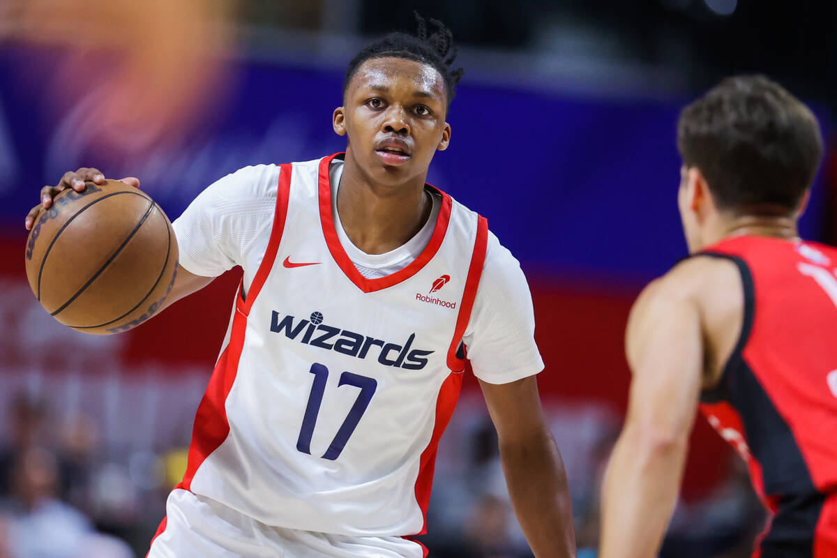 Washington Wizards guard Bub Carrington (17) looks to pass the ball during an NBA Summer League ...