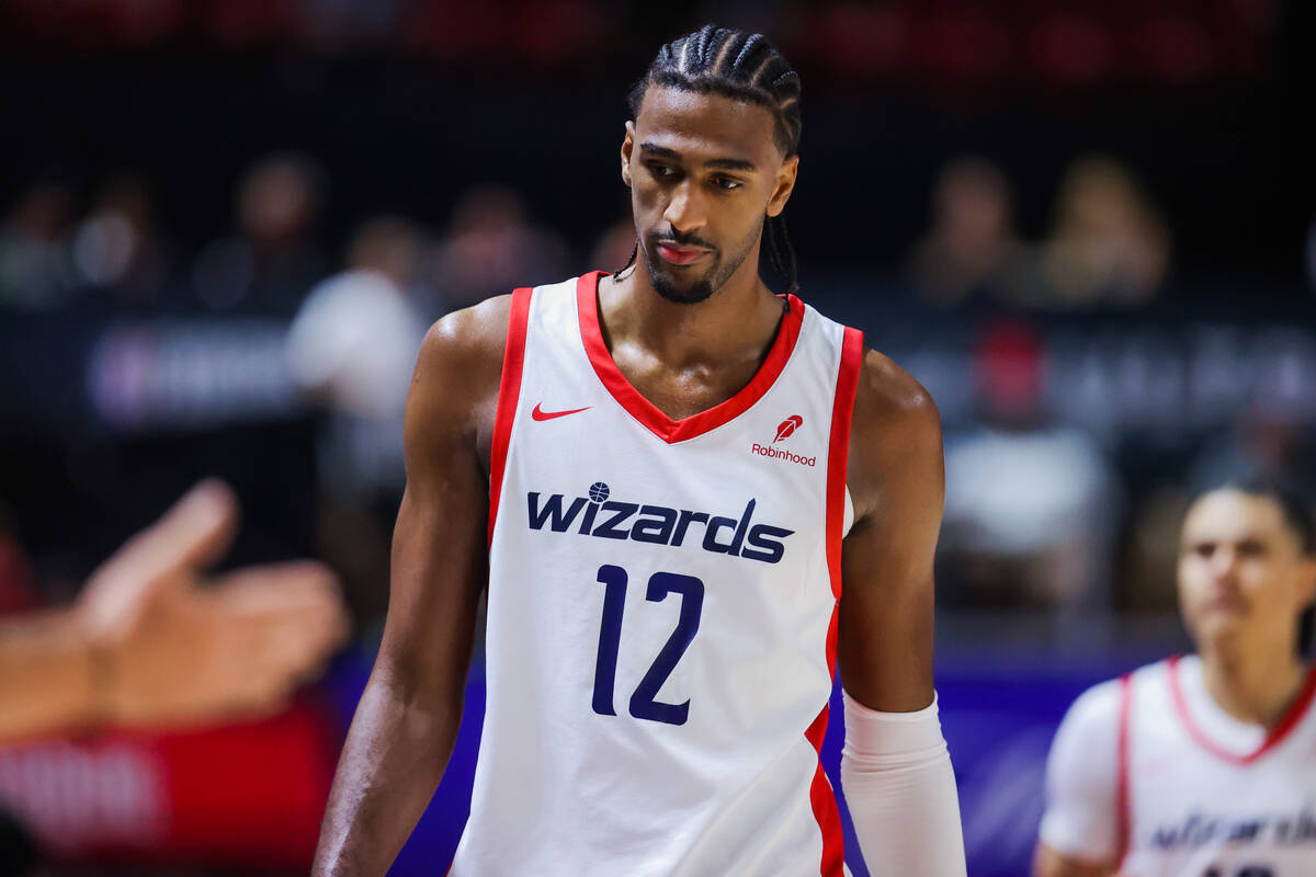 Washington Wizards center Alex Sarr (12) walks down the court during an NBA Summer League game ...