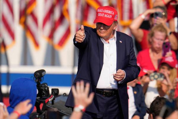 Republican presidential candidate former President Donald Trump speaks at a campaign event in B ...
