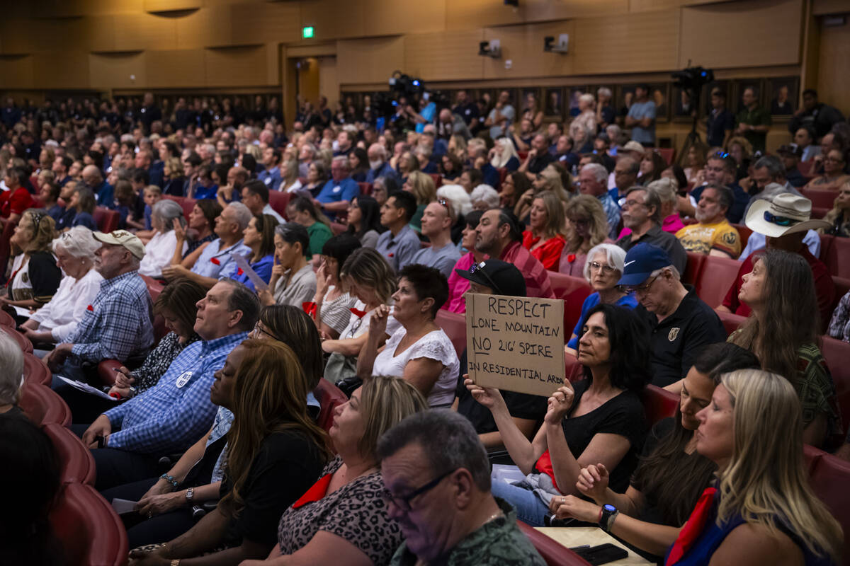 Residents of the Lone Mountain area, in the foreground, who are opposed to a proposed new Churc ...