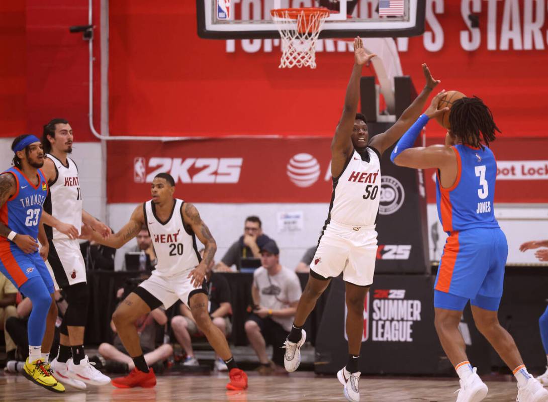 Miami Heat guard Isaiah Stevens (50) defends against Oklahoma City forward Dillon Jones during ...