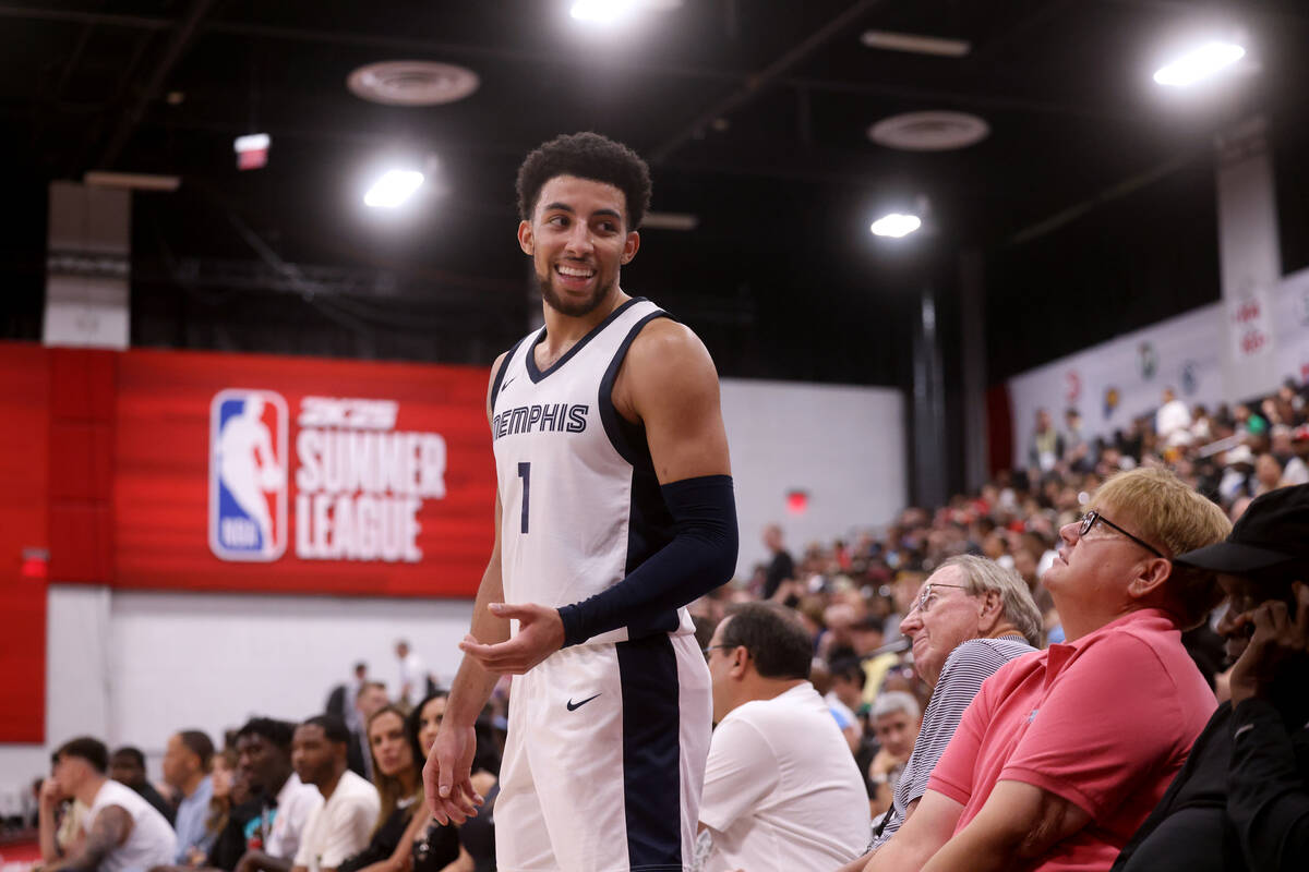 Memphis guard Scotty Pippen Jr. interacts with the crowd as he waits to inbound the ball agains ...