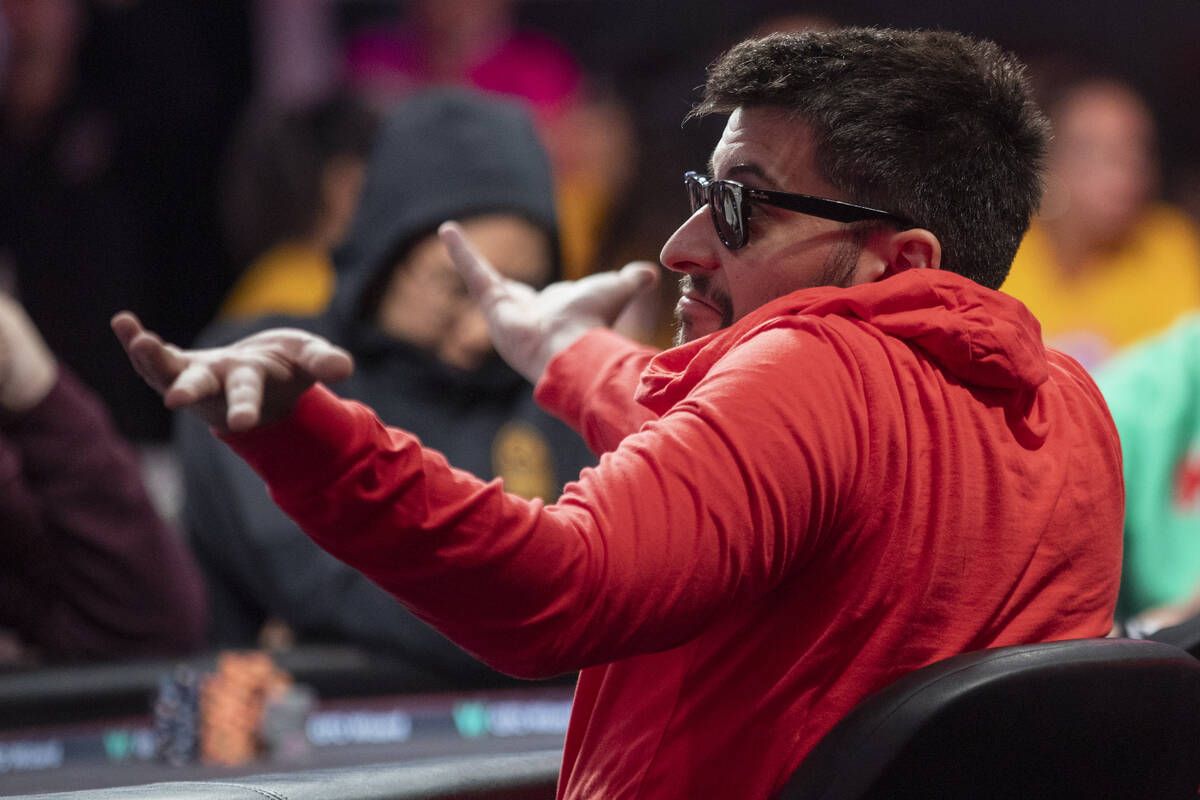 Boris Angelov shrugs to family and friends while competing in the final table of the World Seri ...