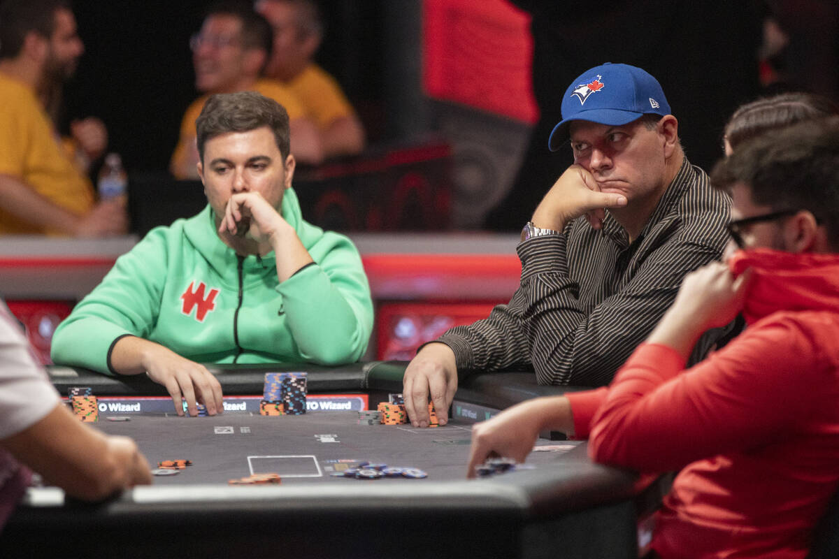 Andres Gonzalez, left, and Jason Sagle, right, compete in the final table of the World Series o ...