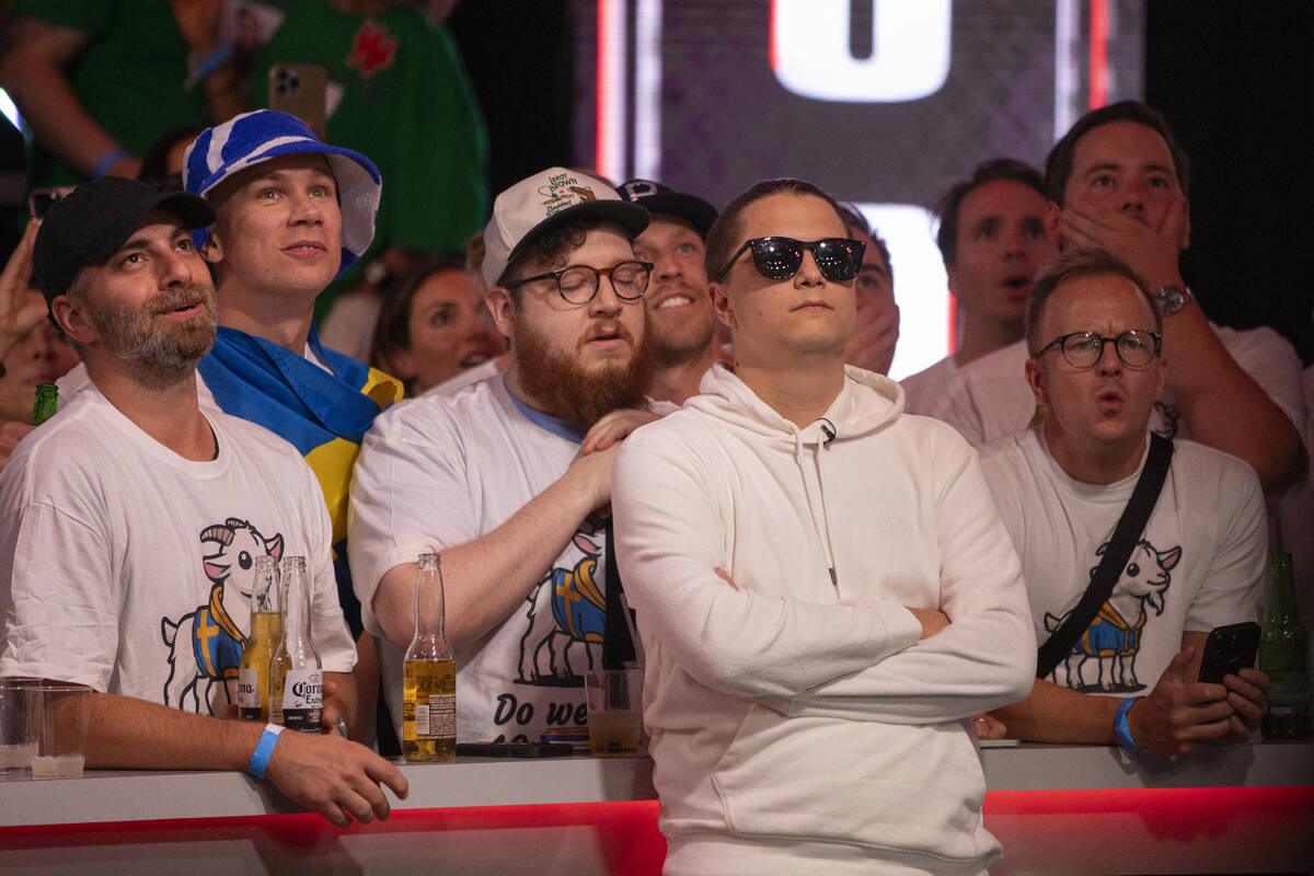 Niklas Astedt watches his hand play out with family and friends during the final table of the W ...