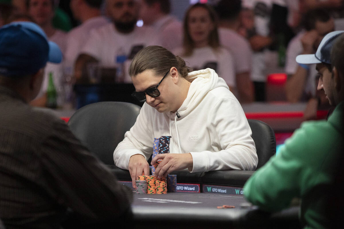 Niklas Astedt stacks his newly won chips during the final table of the World Series of Poker Ma ...