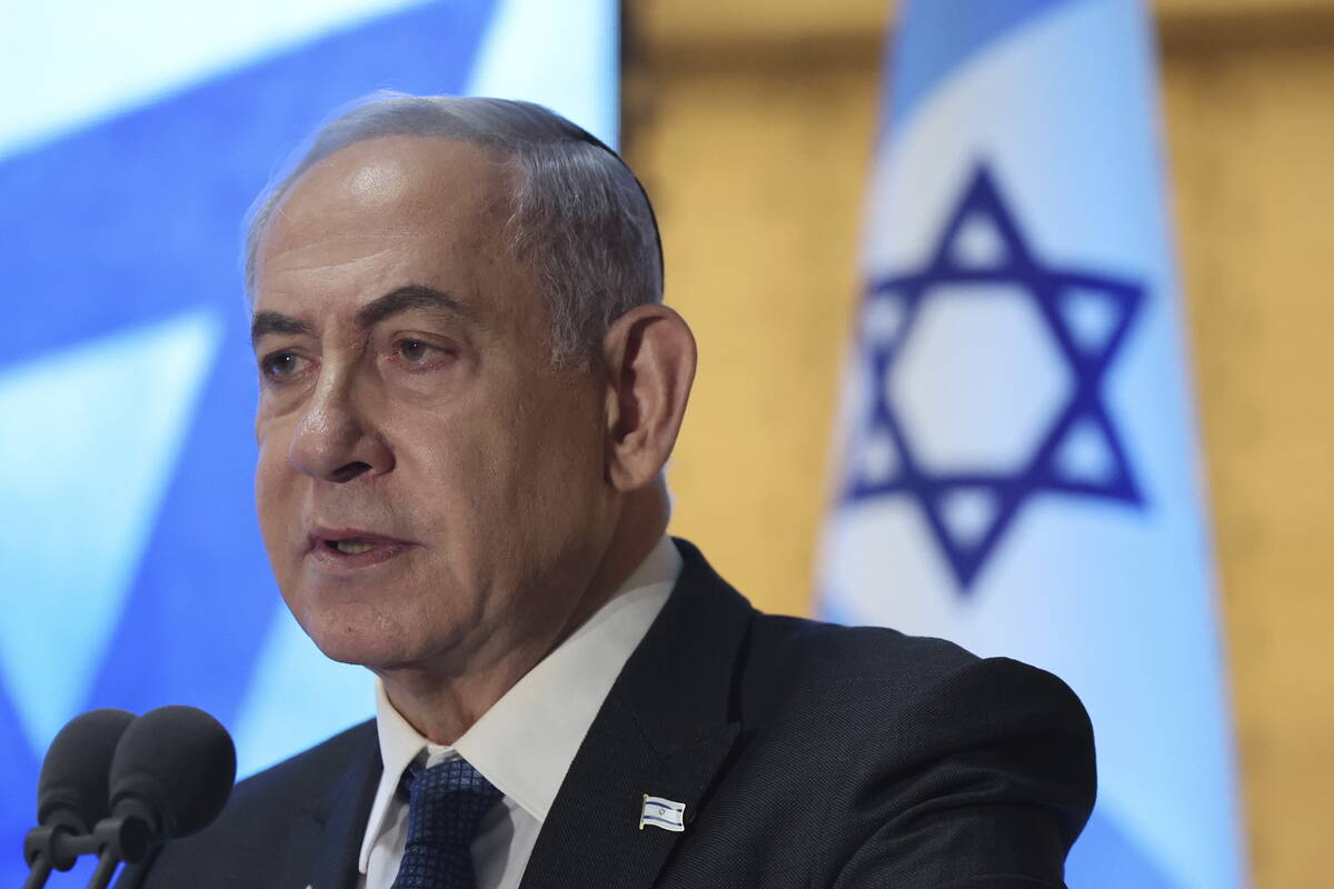 Israeli Prime Minister Benjamin Netanyahu attends a memorial ceremony for Israeli soldiers who ...