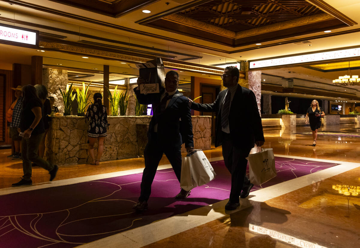 People make their way out during the final night of operations and gaming at The Mirage in the ...