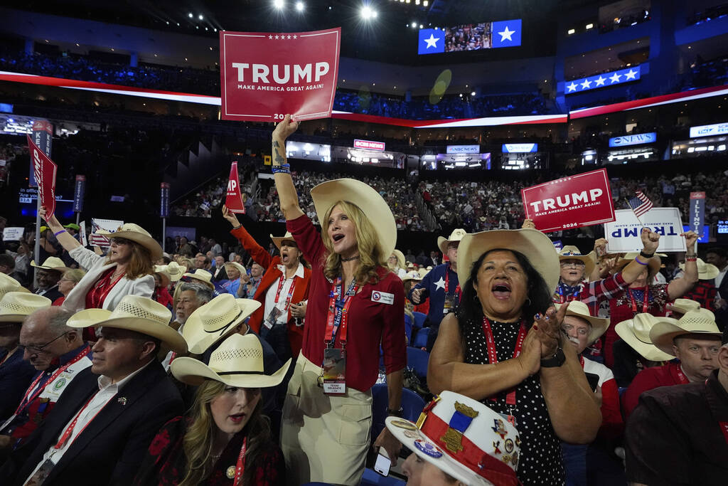 Texas delegates cheer during the Republican National Convention, Tuesday, July 16, 2024, in Mil ...