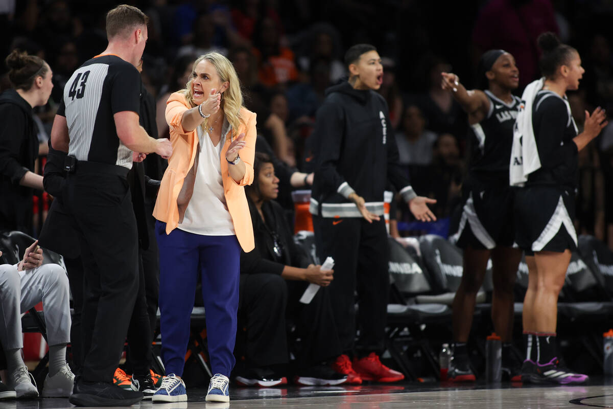 Las Vegas Aces head coach Becky Hammon shouts at a referee during the second half of a WNBA bas ...