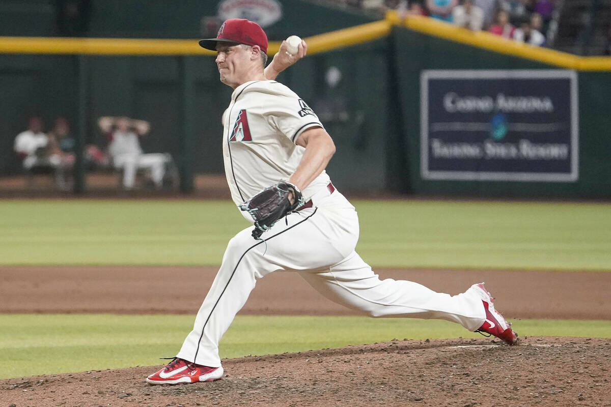 Arizona Diamondbacks pitcher Paul Sewald (38) throws against the Atlanta Braves during the nint ...