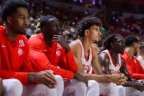 Atlanta Hawks forward Zaccharie Risacher (middle) watches from the bench during an NBA Summer L ...