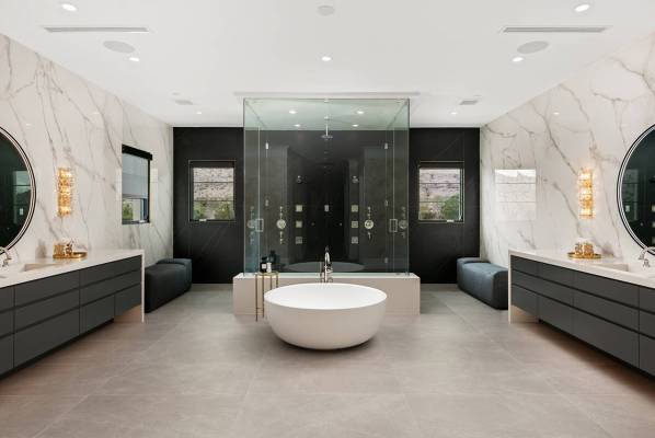 The latest luxury home listing for IS Luxury features a master bath with an elegant timeless de ...