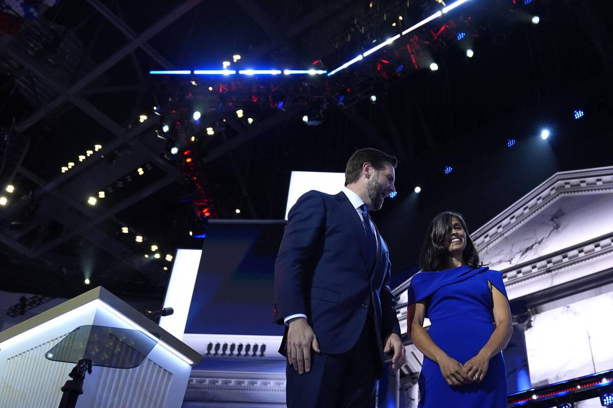 Republican vice presidential candidate Sen. JD Vance, R-Ohio, stands on stage with his wife Ush ...