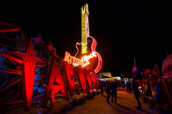 The Hard Rock Cafe guitar sign is illuminated at the Neon Museum in Las Vegas on Monday, March ...