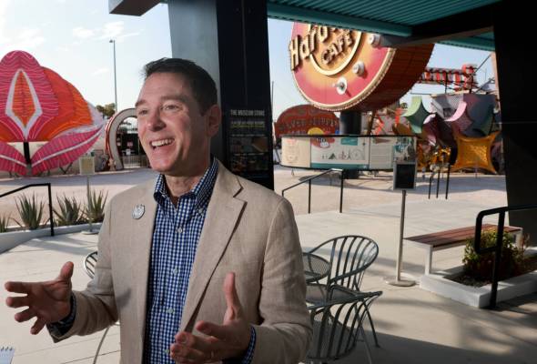 Neon Museum Executive Director Aaron Berger talks to a reporter at the museum’s downtown ...