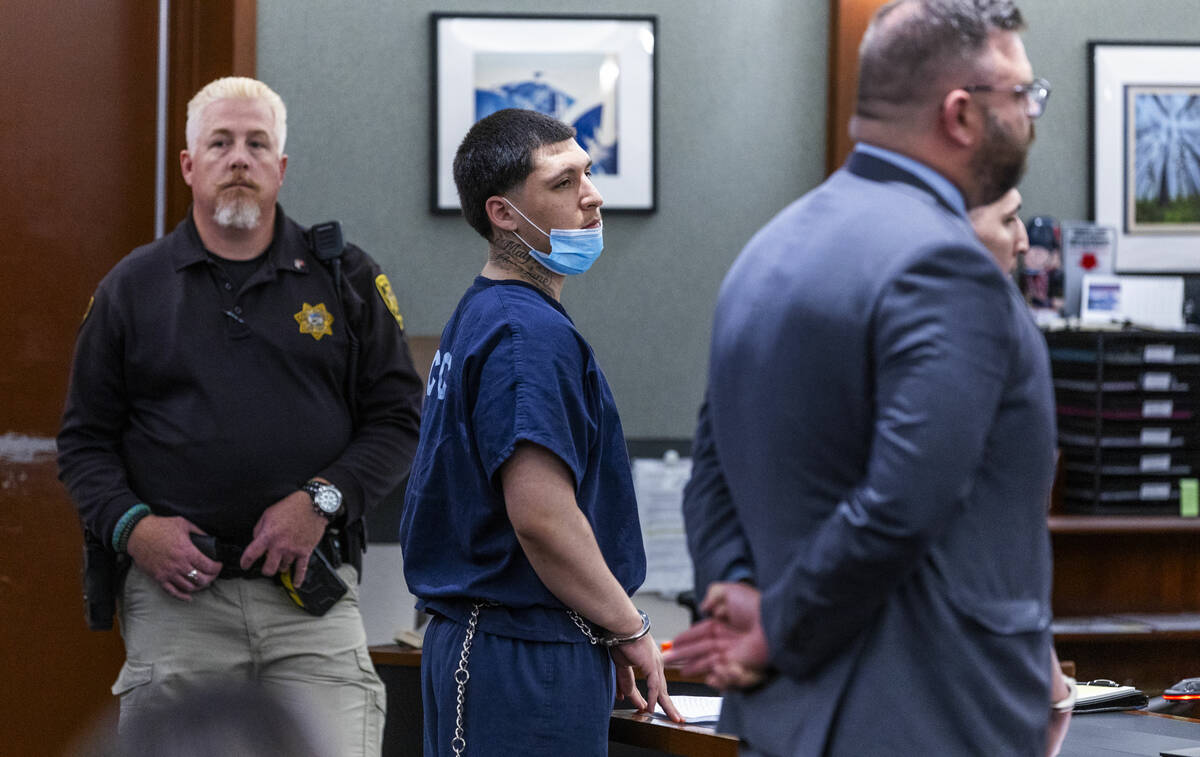 Jesse Rios looks to the judge while standing at the counsel table for his sentencing hearing at ...