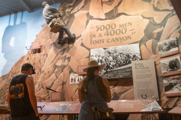 Tourists walk through The Boulder City/Hoover Dam Museum, Friday, July 19, 2024, in Boulder Cit ...