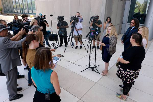 Former Las Vegas City Councilwoman Michele Fiore reads a statement to the news media outside th ...