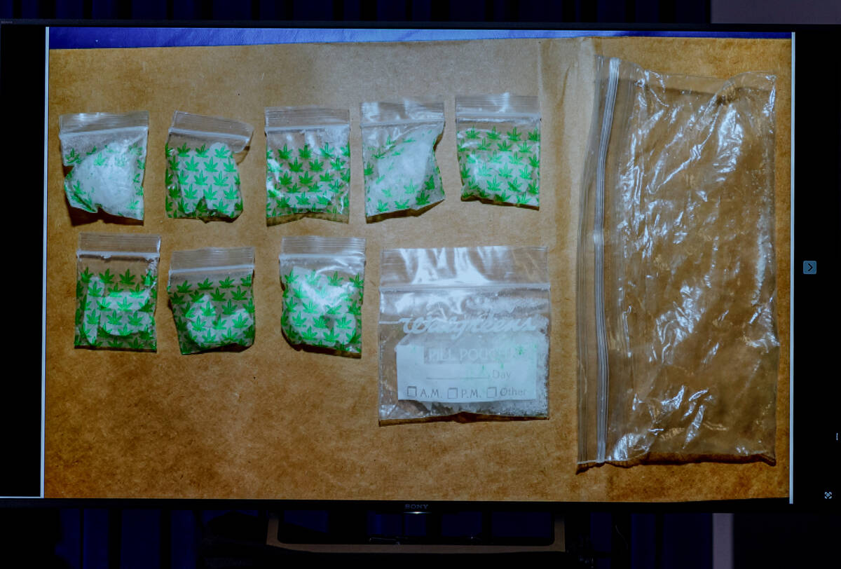 Bags of methamphetamine taken by Metro from a subject's vehicle are shown on a screen Friday, J ...