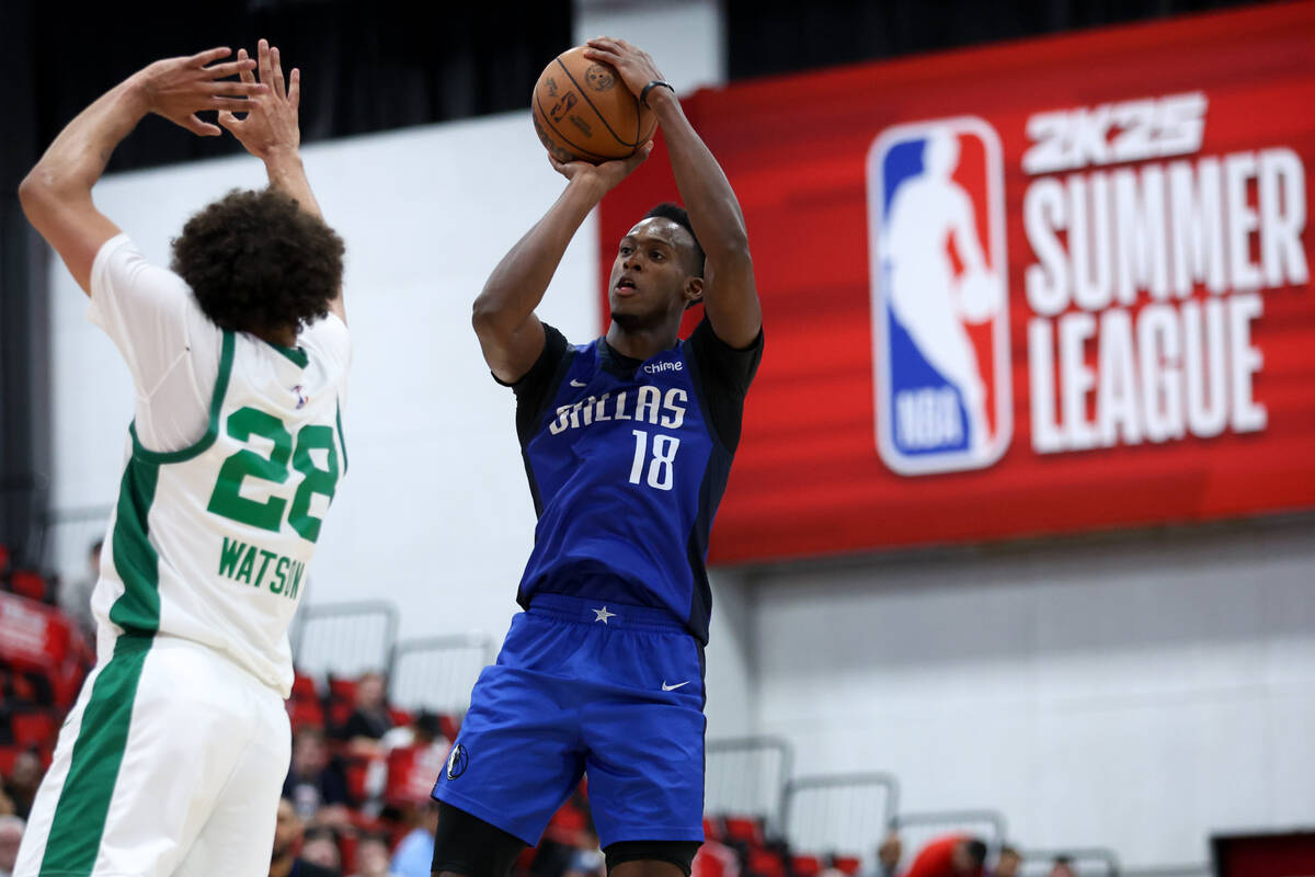 Dallas Mavericks forward Olivier-Maxence Prosper (18) shoots while Boston Celtics forward Anton ...