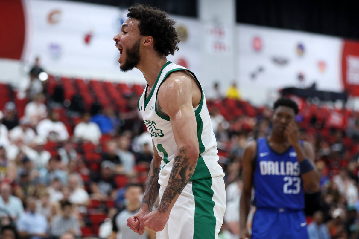 Boston Celtics guard Jaelen House celebrates after scoring and drawing a foul during an NBA sum ...