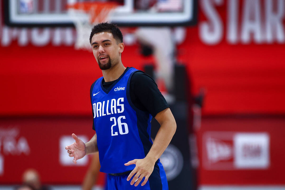 Dallas Mavericks guard Jarod Lucas (26) reacts after scoring during an NBA summer league basket ...