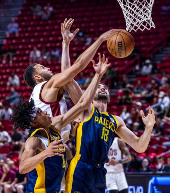 Cleveland Cavaliers center Pete Nance (8) slaps the ball away from Indiana Pacers center Indian ...
