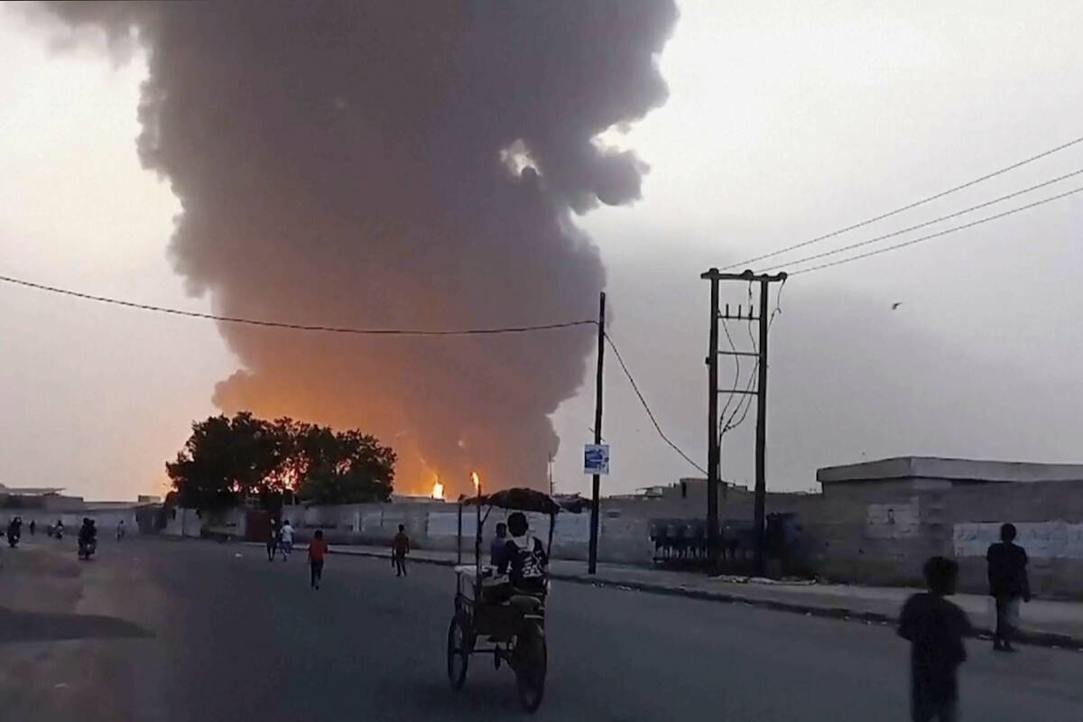 In this image from video, smoke and flames rise from a site in Hodeidah, Yemen, on Saturday, Ju ...