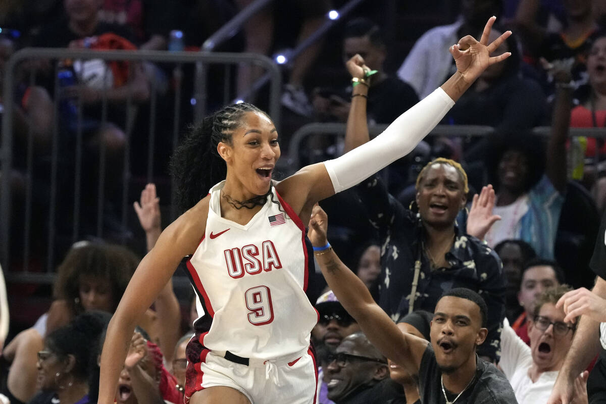 A'ja Wilson, of Team USA, celebrates after she made 3-point basket against Team WNBA during the ...