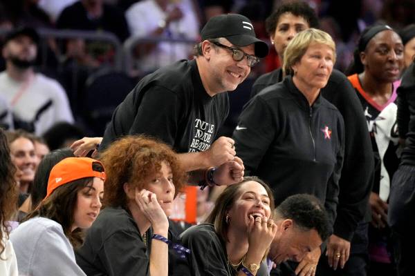 Actor Jason Sudeikis cheers after a score during the second half of a WNBA All-Star basketball ...