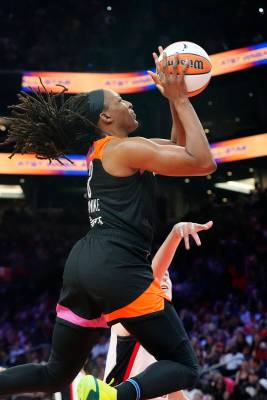 Nneka Ogwumike, of Team WNBA, goes up to score against Team USA during the second half of a WNB ...