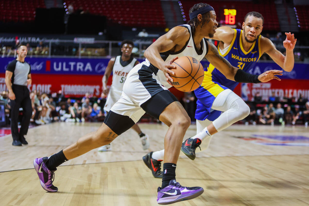 Miami Heat guard Alondes Williams (15) drives the ball to the net during an NBA Summer League b ...