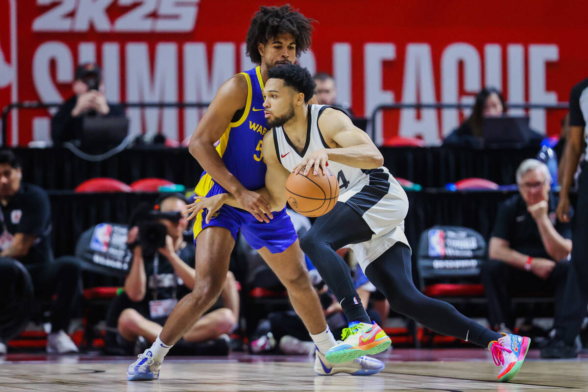 Miami Heat guard Caleb Daniels (54) rushes the ball to the basket during an NBA Summer League b ...