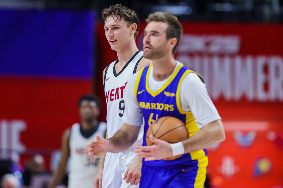 Miami Heat guard Pelle Larsson (9) reacts to the referee calling a foul on the Golden State War ...