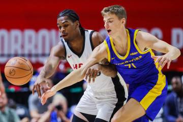 Miami Heat guard Josh Christopher (53) and Golden state Warriors forward/guard Mantas Rubstavic ...