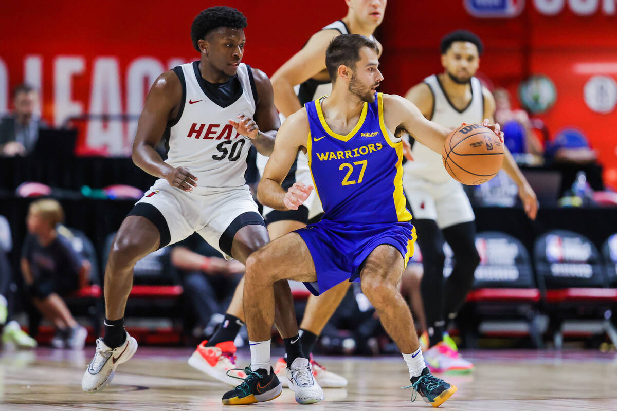 Golden State Warriors guard Santiago Vescovi (27) dribbles the ball during an NBA Summer League ...