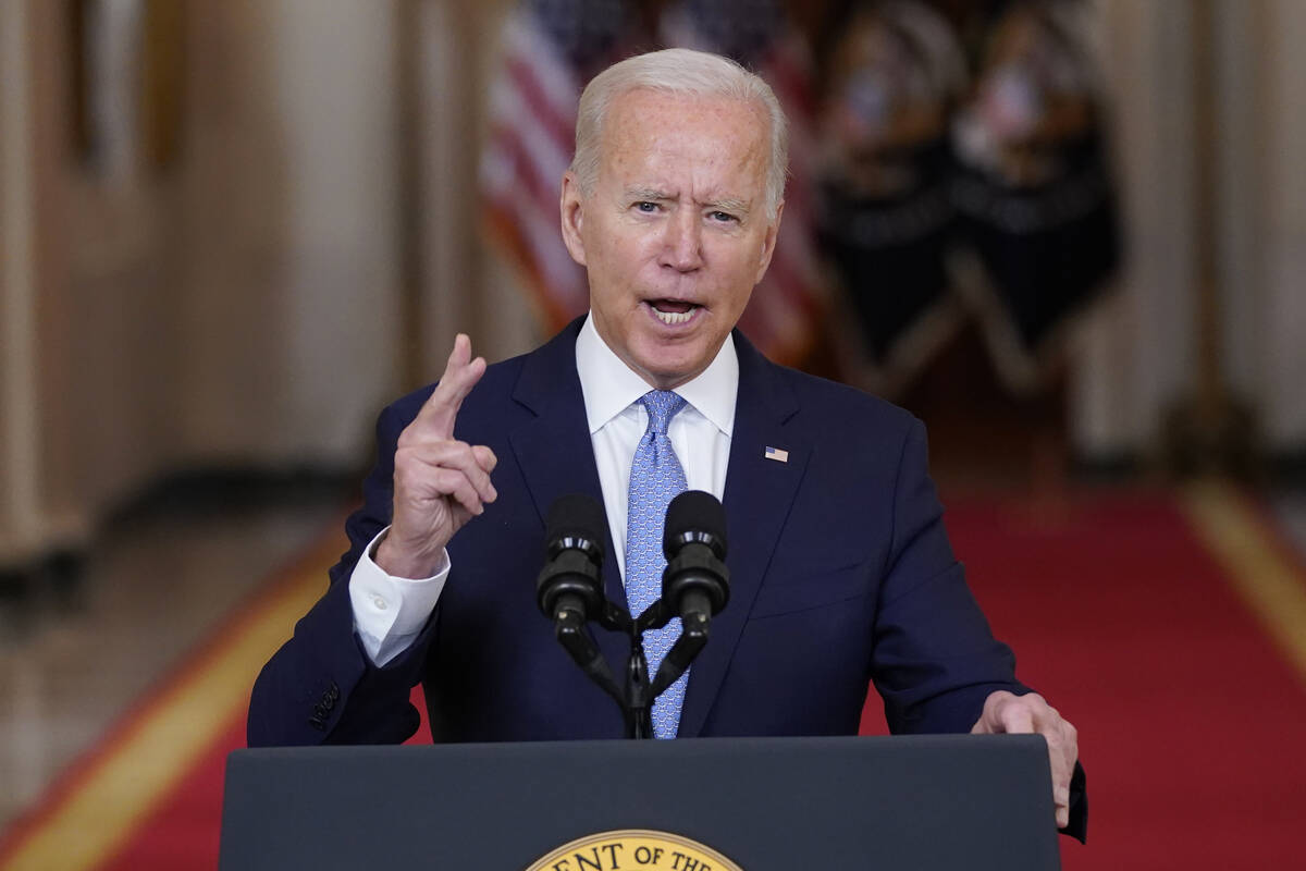 FILE - President Joe Biden speaks about the end of the war in Afghanistan from the State Dining ...