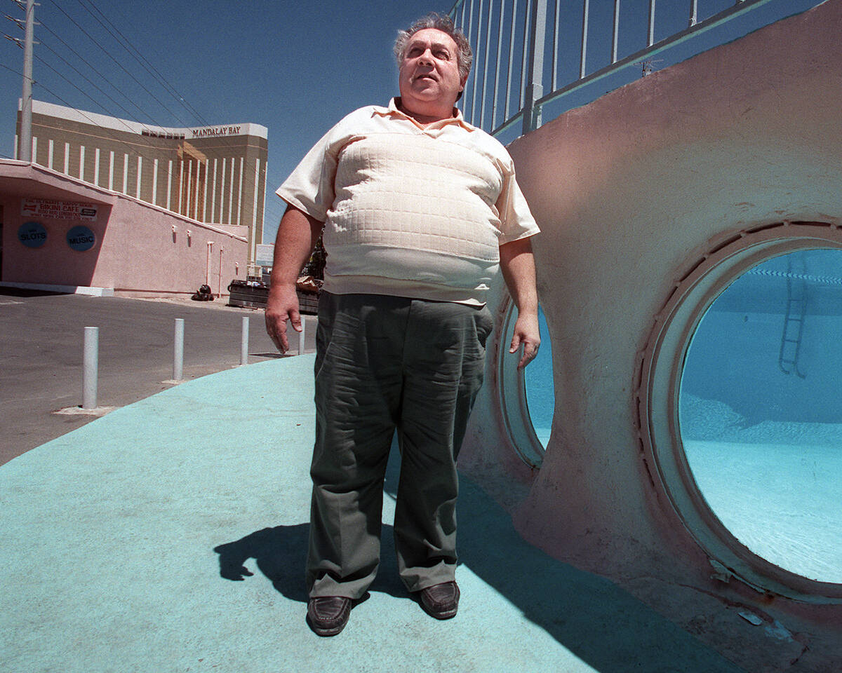 Alan Rosoff, owner of the Glass Pool Inn, stands by the property’s swimming pool on Aug. 3, 1 ...