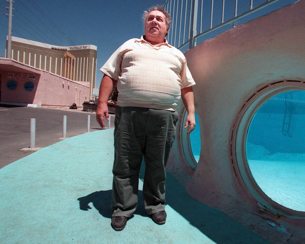 Alan Rosoff, owner of the Glass Pool Inn, stands by the property’s swimming pool on Aug. 3, 1 ...