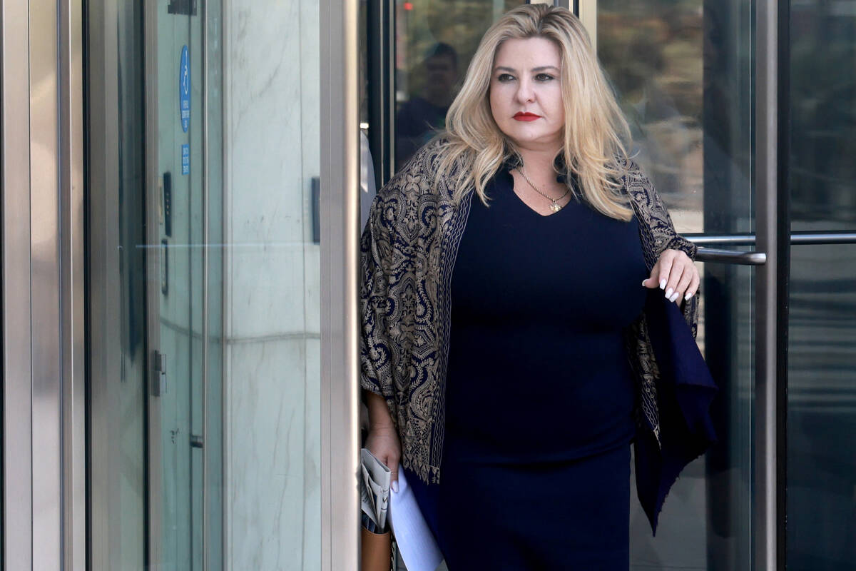 Former Las Vegas City Councilwoman Michele Fiore walks out of the Lloyd George U.S. Courthouse ...