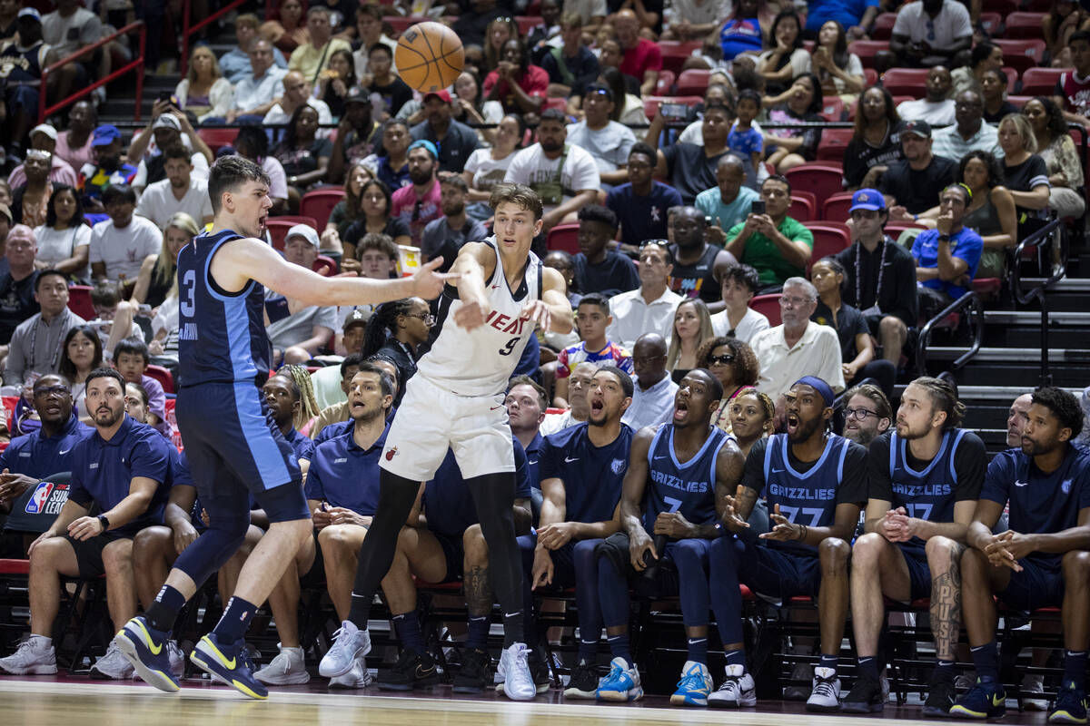 Miami Heat guard Pelle Larsson (9) attempts to throw in the ball during the NBA Summer League C ...