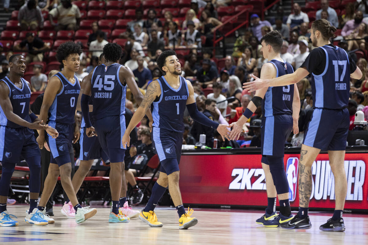 Memphis Grizzlies guard Scotty Pippen Jr. (1) high-fives teammates during the NBA Summer League ...