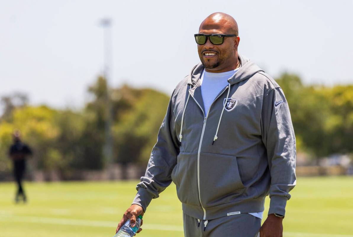 Raiders head coach Antonio Pierce walks the field as he arrives for a news conference at the Ja ...