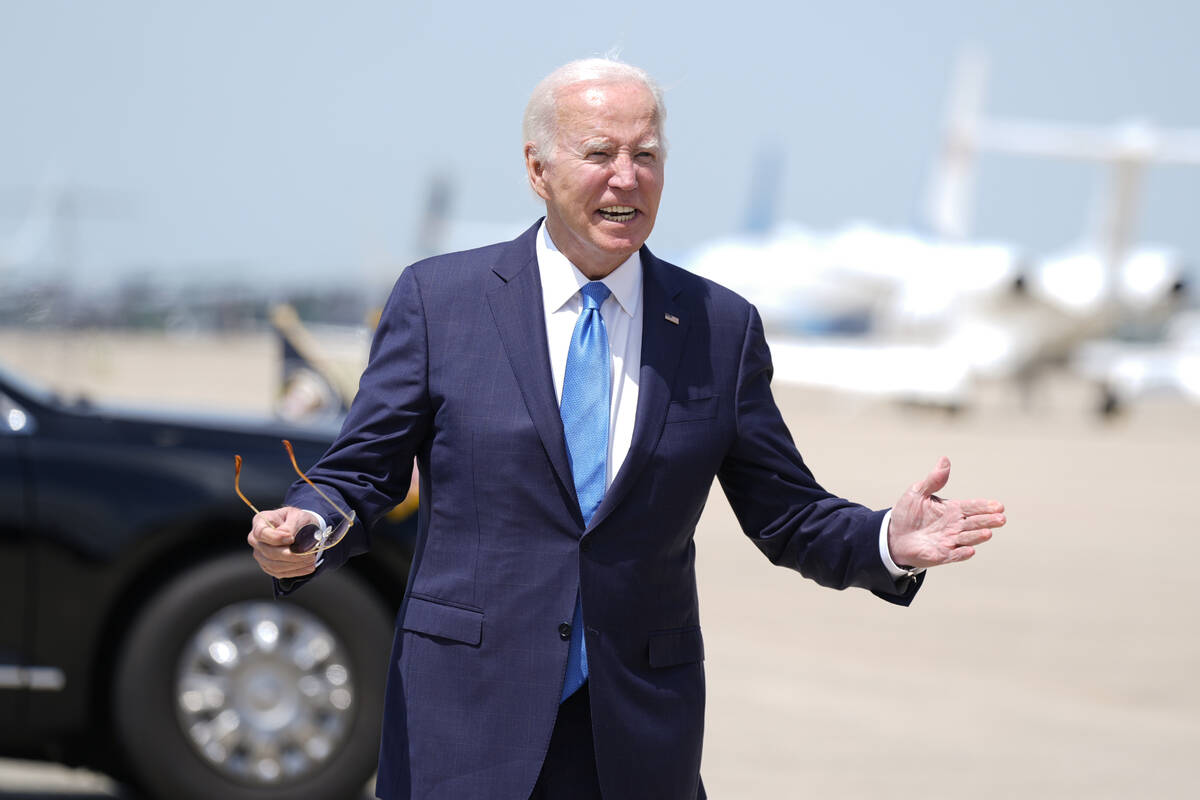 President Joe Biden disembarks Air Force One as he arrives Andrews Air Force Base, Md., Tuesday ...