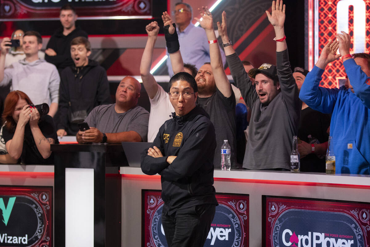 Jonathan Tamayo, center, is surprised after winning a hand in the final table of the World Seri ...