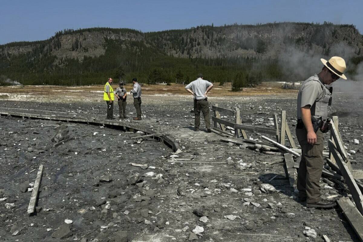 In this photo released by the National Park Service, park staff assess the damage to Biscuit Ba ...