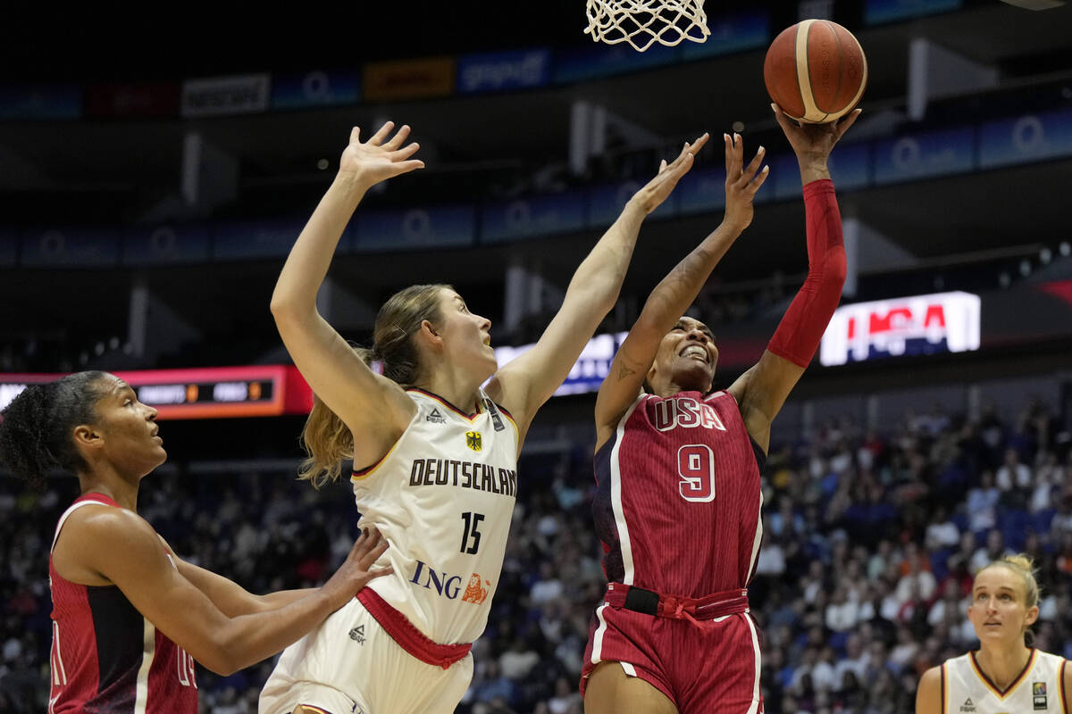 United States' A'ja Wilson, right, attempts to score during a women's exhibition basketball gam ...