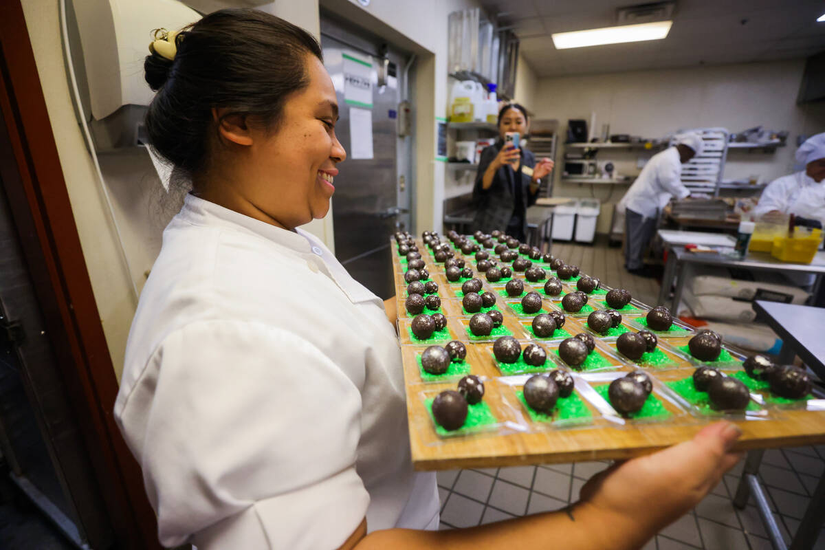 Desserts made by students are brought out at the Culinary Academy of Las Vegas on Friday, July ...