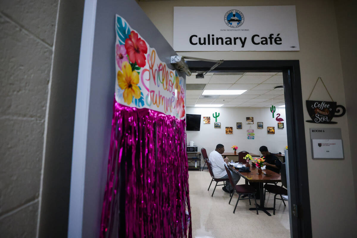 People eat inside of a cafe where students learn how to perfect their barista skills at the Cul ...